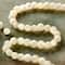 12 Pack: White Mother of Pearl Round Beads, 4mm by Bead Landing™